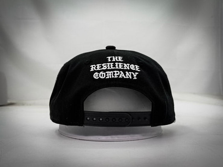 "RESILIENCE MONARCHS" 5 PANEL SNAPBACK HAT IN BLACK