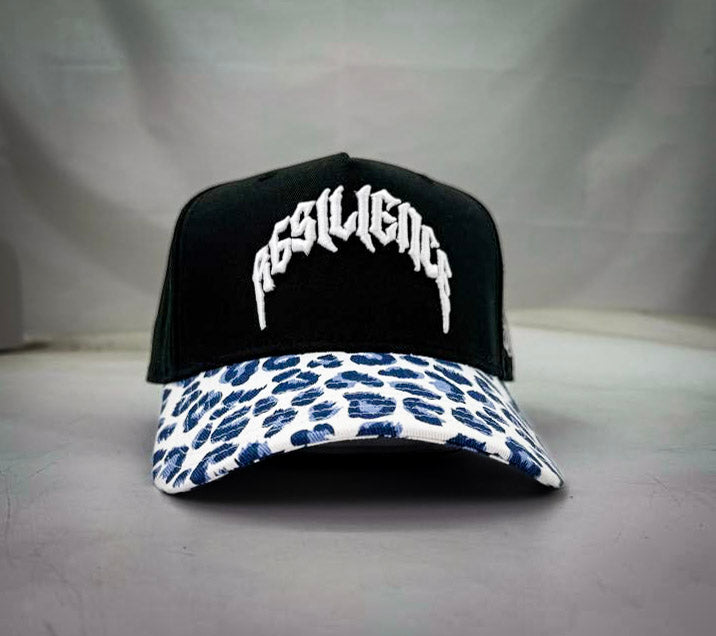 RESILIENCE 5 PANEL HAT IN LEOPARD PRINT & BLACK