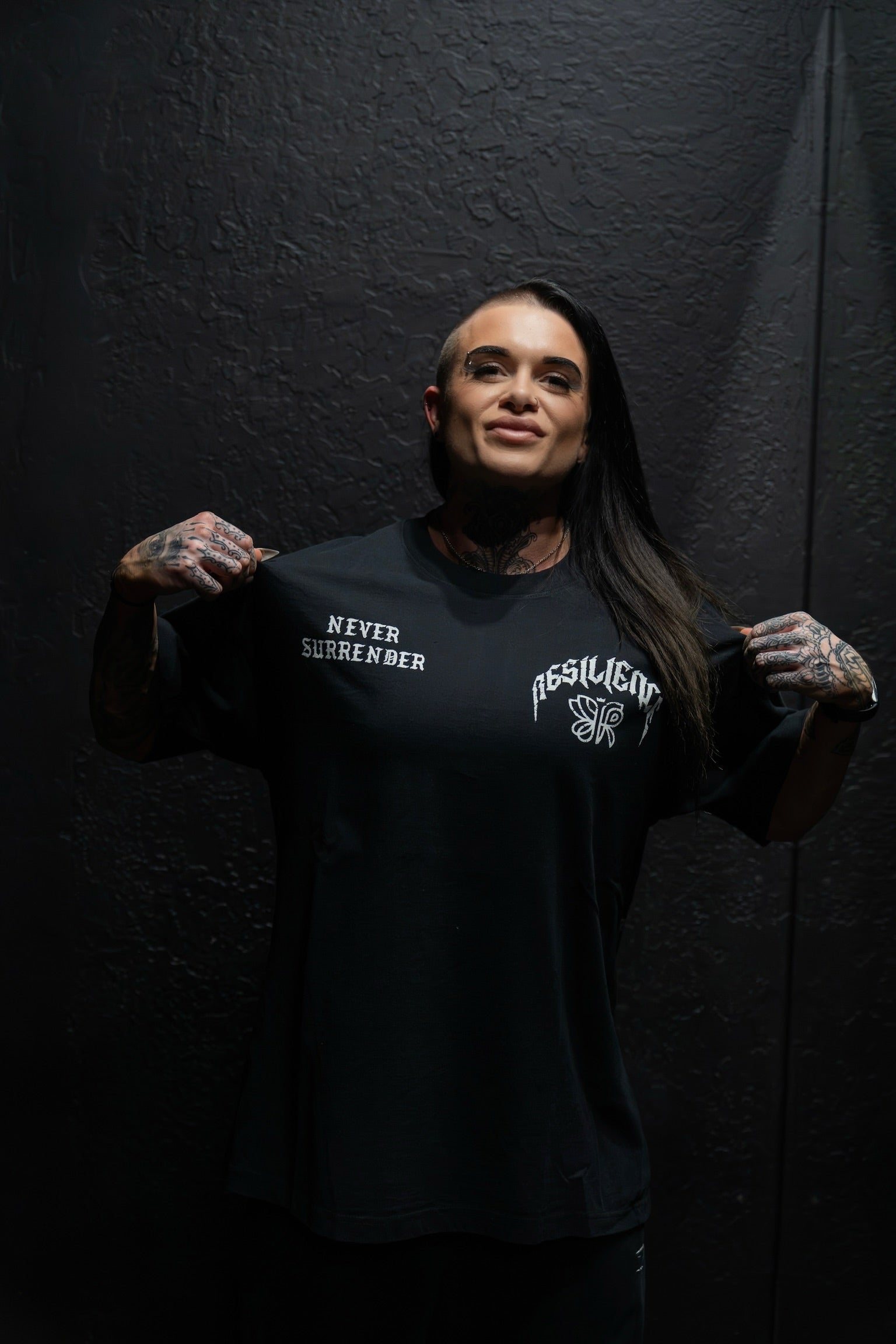 NEVER SURRENDER- “Delaney Smallwood/ Muscle Factory”